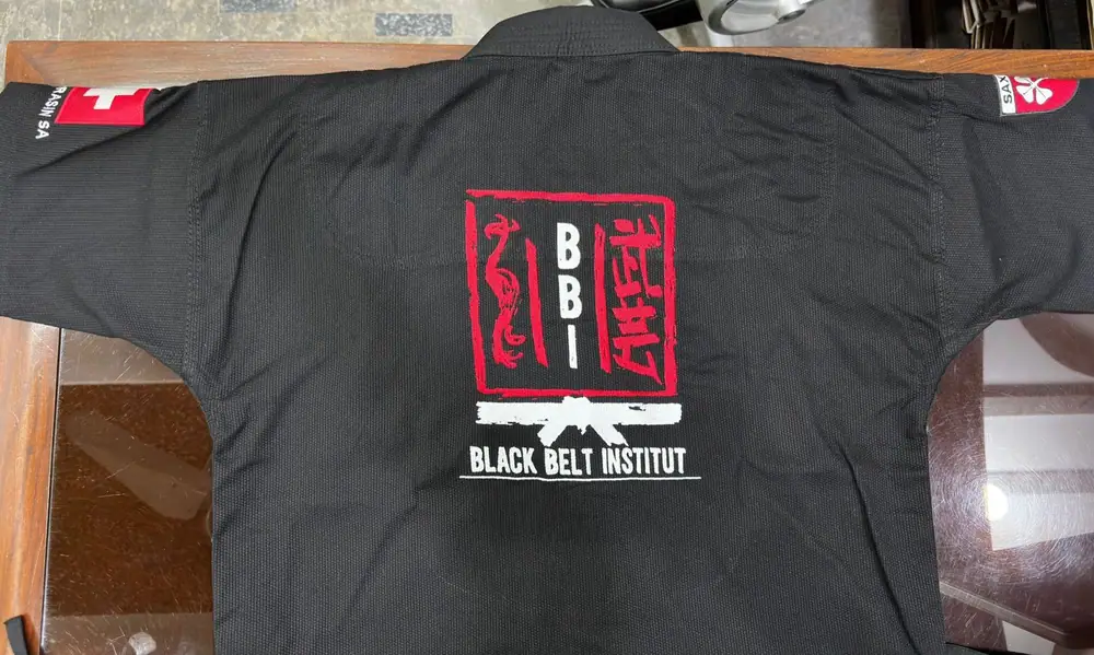 Black Belt Institut fight jacket, BBI logo on the back